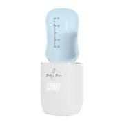 Baby bottle with blue cap and white base on a white background