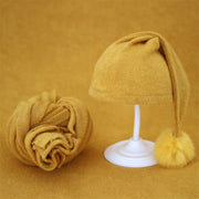Conjunto de bebé con gorro tejido con bolas de pelo y manta para bebé