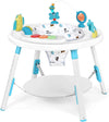 Baby activity center with colorful toys on a white background