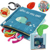Children's book with soft toys and accessories on a white background