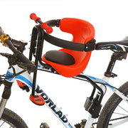 Child bike seat with orange cushion on a bicycle