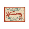 Vintage-style sign with 'Welcome to the Williams Holiday Home' text and Santa Claus illustration on a beige background.