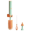 Set of cleaning brushes with a green and orange design on a white background