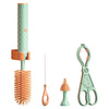 Set of cleaning tools including a brush, scraper, and scissors with a white background