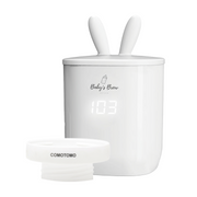 White baby bottle warmer with digital display and 'Baby's Brew' branding on a white background
