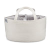 White woven basket with striped interior on a white background