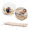 Children playing with a wooden rocking toy on a white background